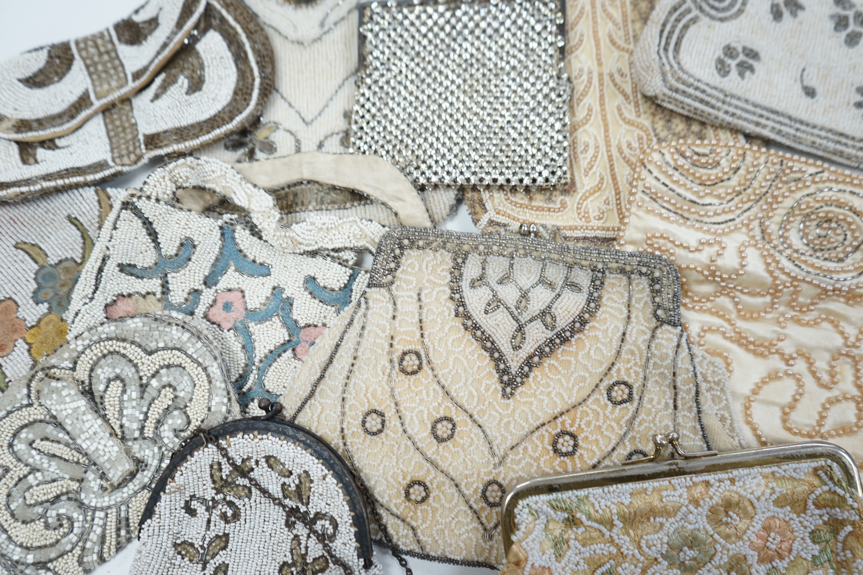 Twelve 1930’s beaded, sequin and pearl evening clutch bags and bags, some with embroidered decoration